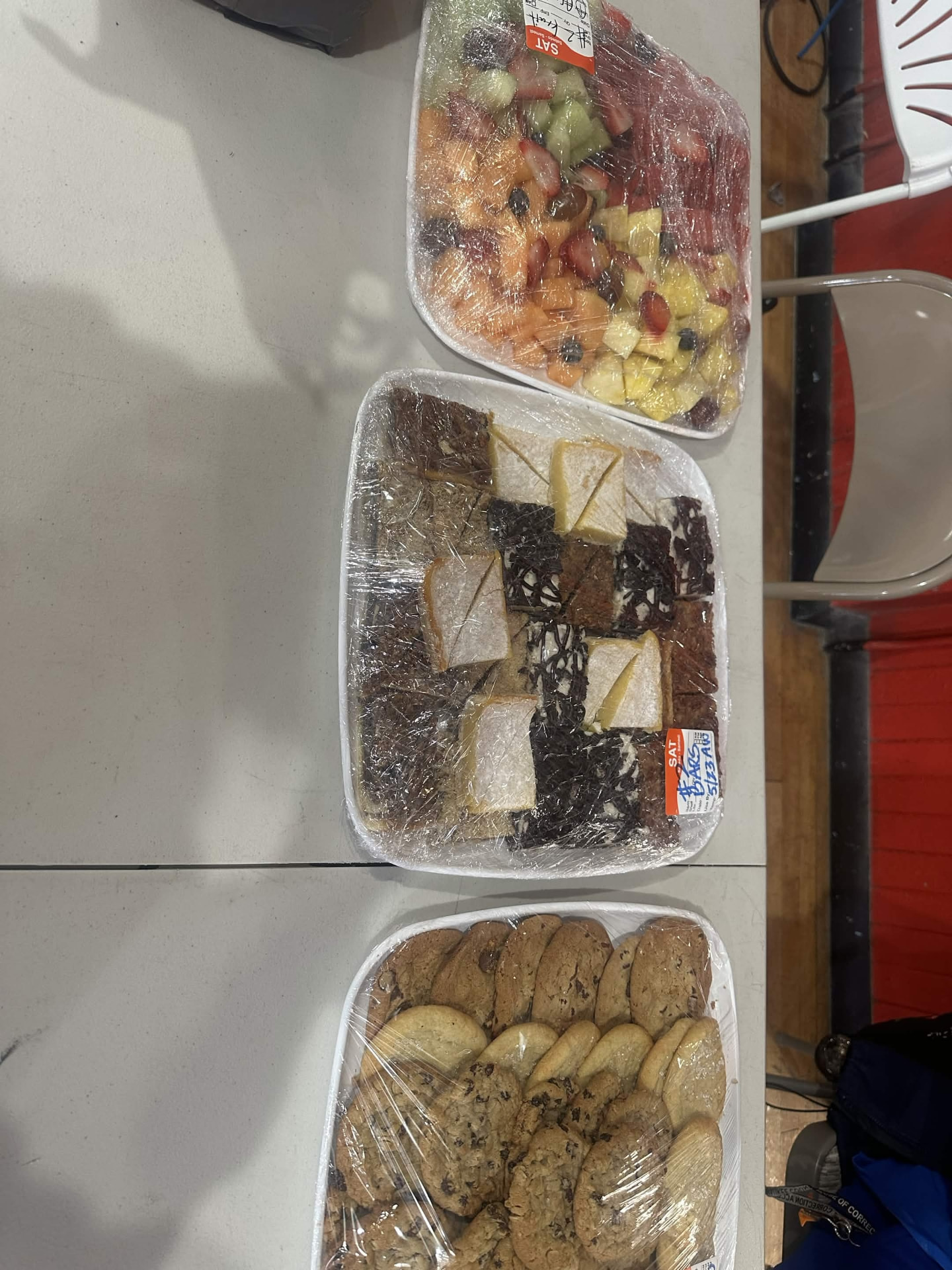 Shared food set out for participants, families, and volunteers.
